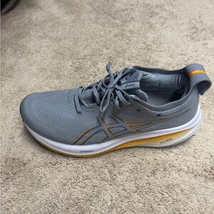 Asics Gray and Orange Athletic Shoes with Sleek Design